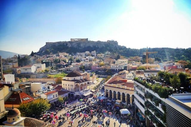 A view Peoples at street and rooftops of Parthenon Acropolis city, Athens