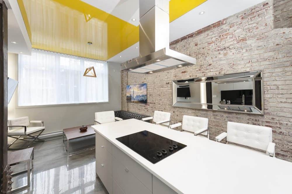 A kitchen with a sink and a window at Boutique Lofts Milton Parc hotel in Montreal