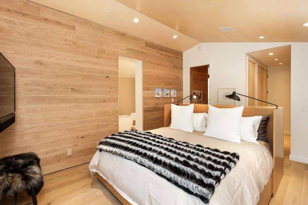 An inside view into the bedroom of Mountain Queen #9 Hotel in Aspen