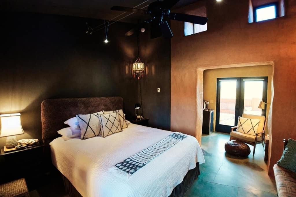 Sacred Sands - a boho-chic, rustic boutique accommodation surrounded by views of the desert and mountains