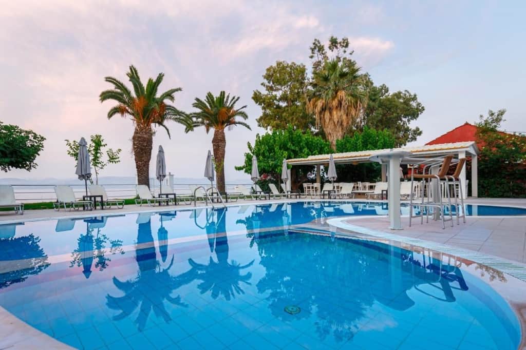 Sirocco Hotel - a bright, petite and newly renovated hotel with Insta-worthy views overlooking the picturesque Ionian Sea